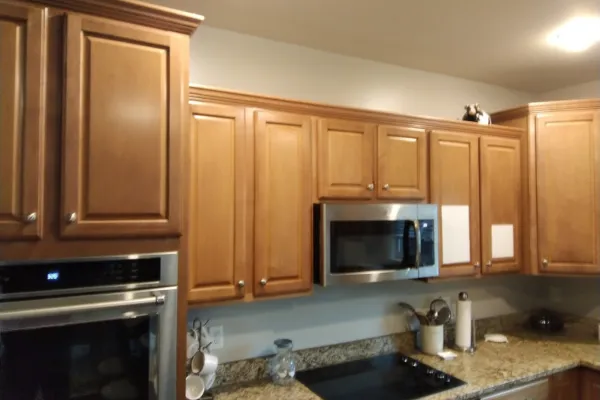 BEFORE Before - Upper Cabinets Near Sink